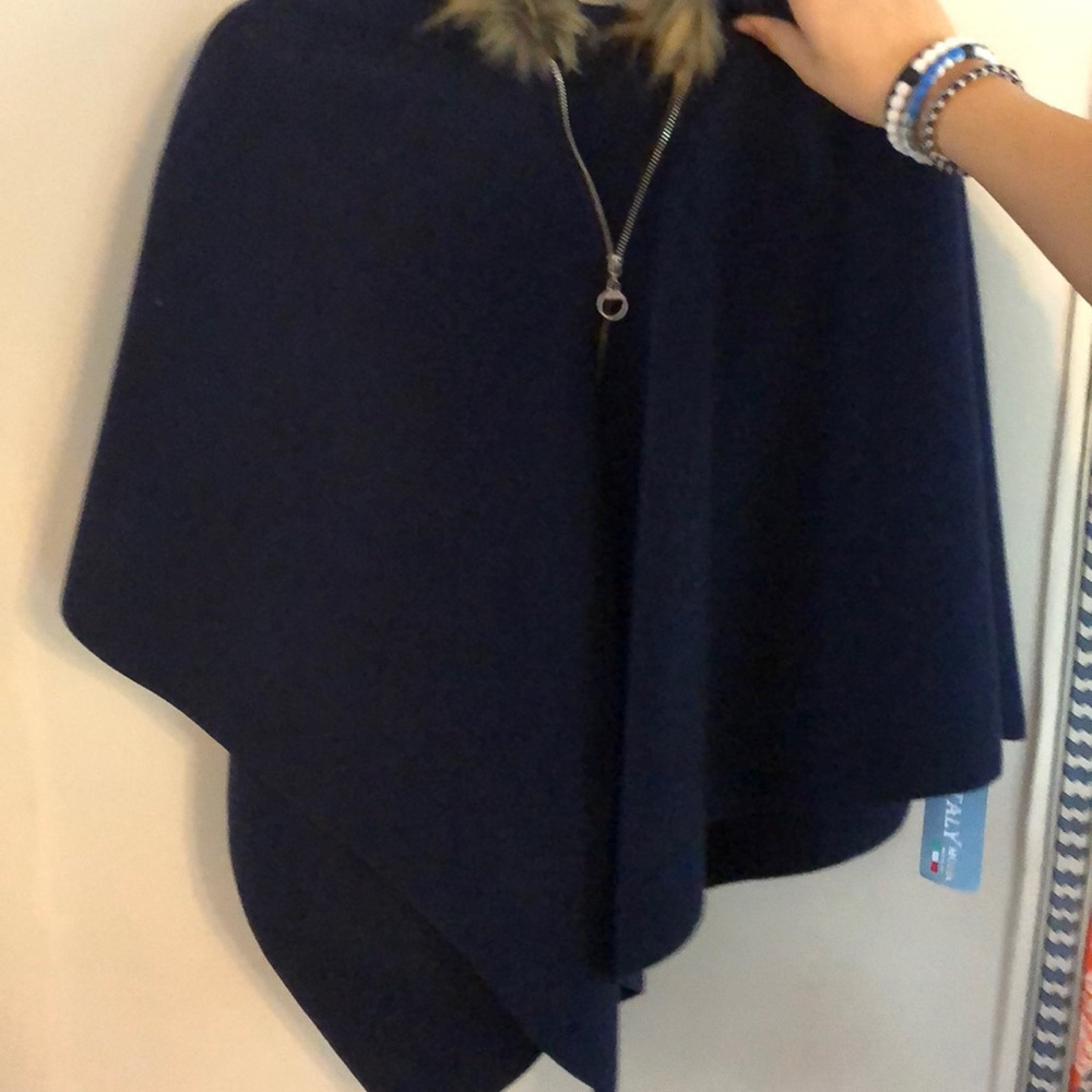 Italian fur-lined poncho with tags